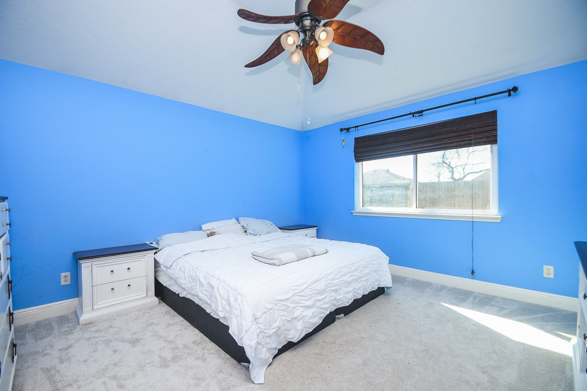 10823 Windswept Montgomery, TX 77356 - Photo 15 of 32 a bedroom with a bed and a window