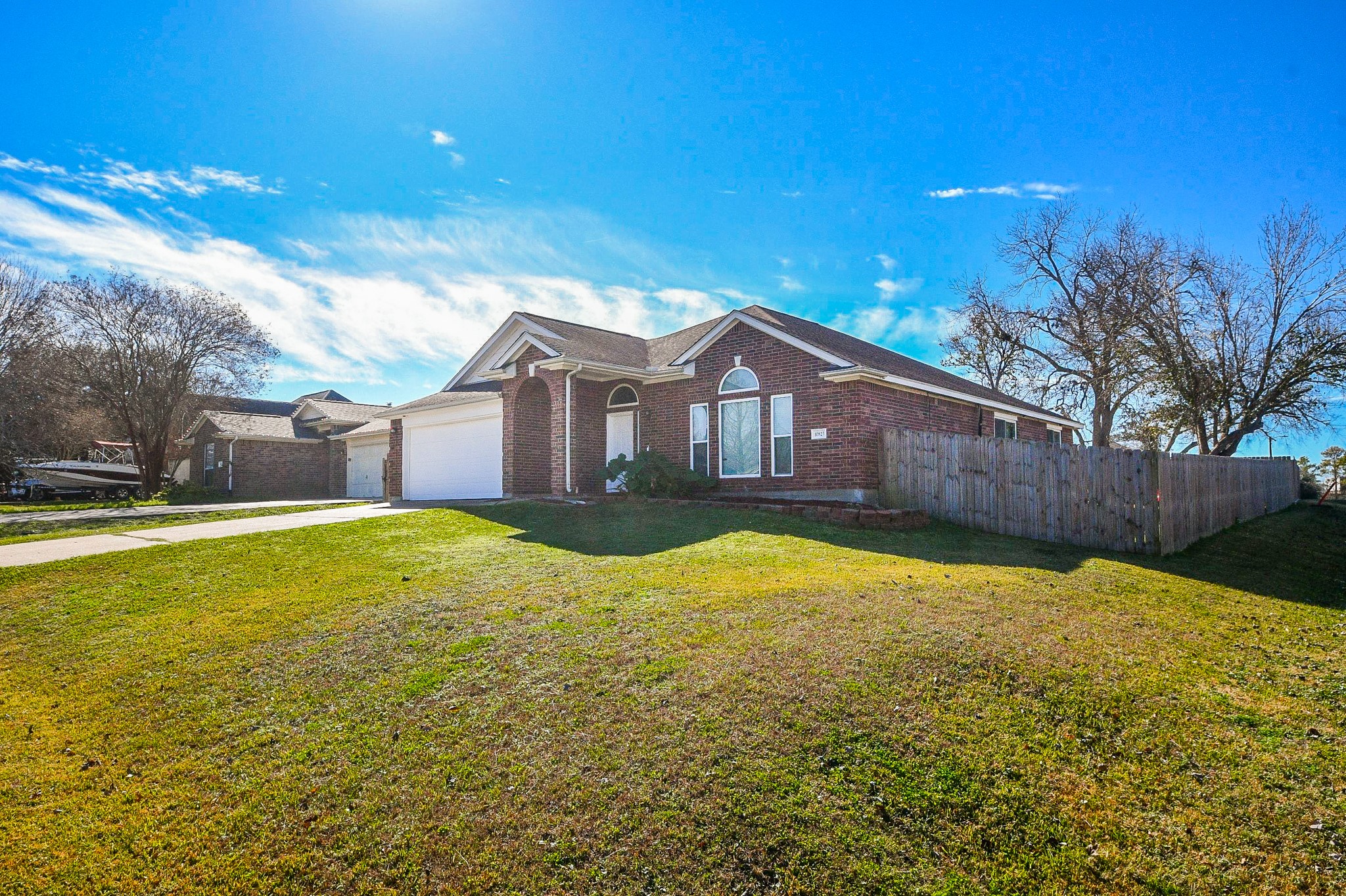 10823 Windswept Montgomery, TX 77356 - Photo 2 of 32 a view of a house with a yard