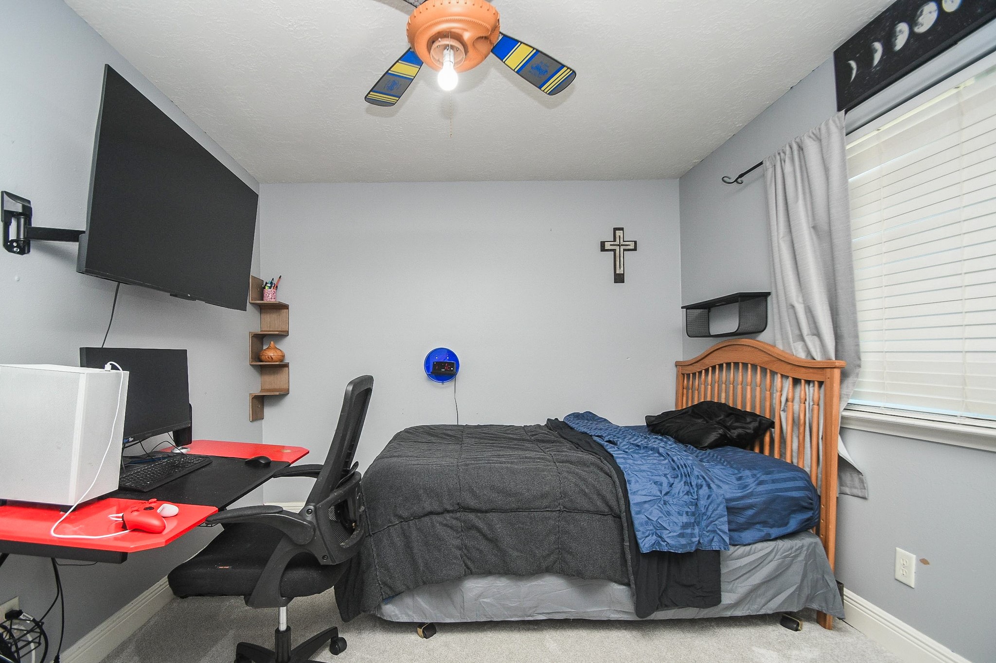 10823 Windswept Montgomery, TX 77356 - Photo 23 of 32 a bedroom with a bed and a window
