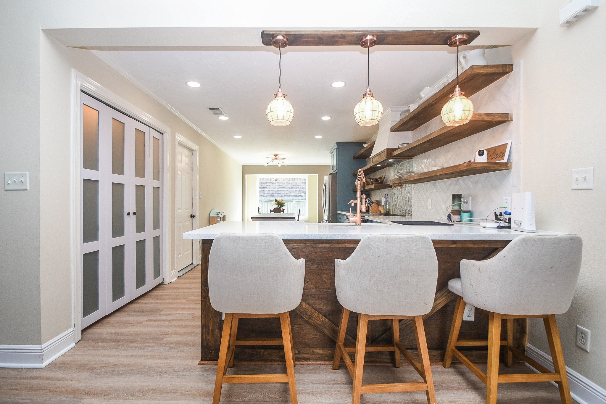 10823 Windswept Montgomery, TX 77356 - Photo 9 of 32 a view of a dining room with furniture and wooden floor