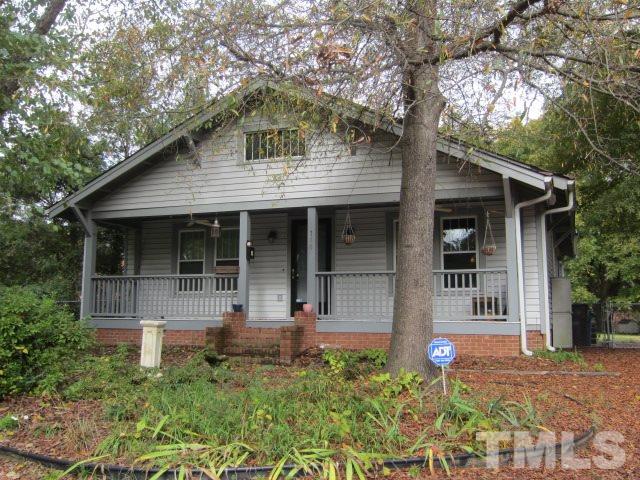 716 Crosby Road Durham, NC 27704 - Photo 1 of 17 a front view of a house with garden