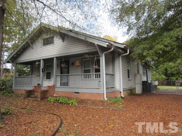 716 Crosby Road Durham, NC 27704 - Photo 2 of 17 a front view of a house with a porch