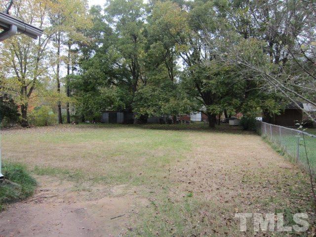 716 Crosby Road Durham, NC 27704 - Photo 16 of 17 a view of a yard with trees