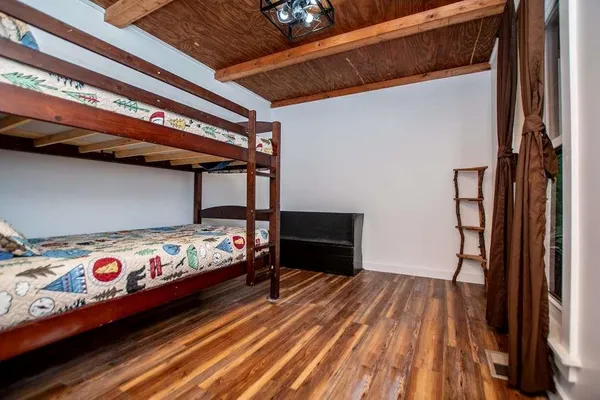 a bedroom with bunk bed