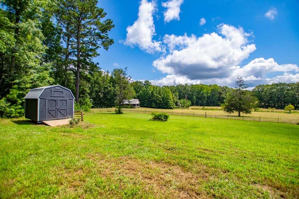 323 Newman Road Franklin, GA 30217 - Photo 25 of 47 a view of a house with a big yard