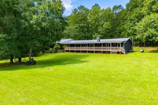 a view of a swimming pool and outdoor space