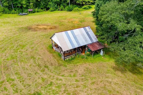 a view of a lake with a yard
