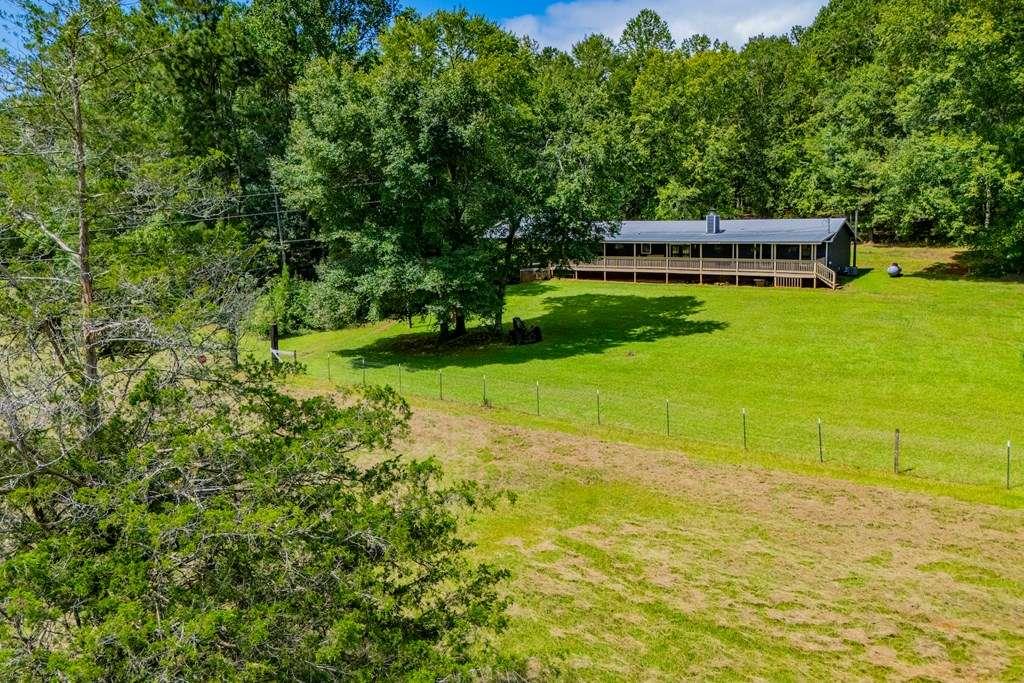 323 Newman Road Franklin, GA 30217 - Photo 33 of 47 a view of a house with a big yard