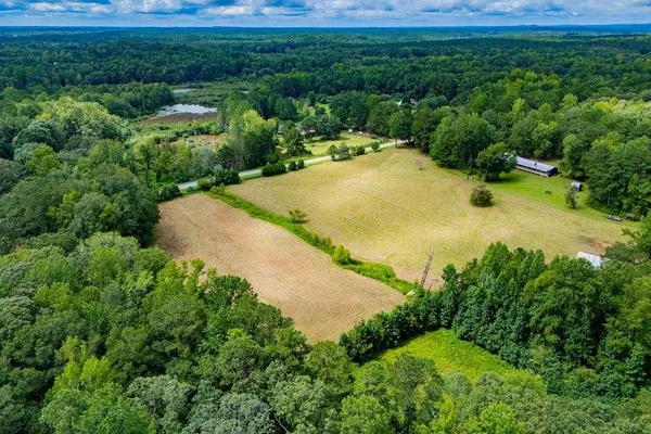 a view of a backyard of the house