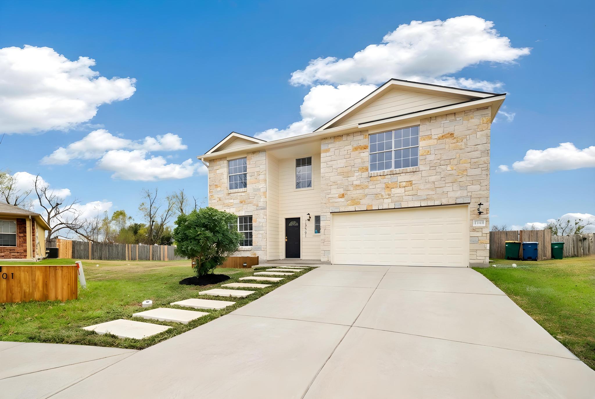 13501 Sierra Wind Lane Elgin, TX 78621 - Photo 19 of 19 Contemporary two-story residence featuring a stone and siding exterior