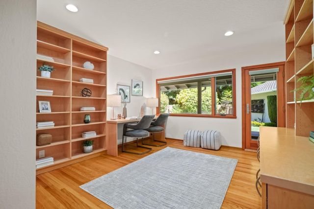a living room with furniture and a gate