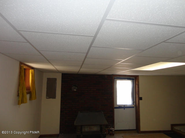 6183 Decker (aka 904 Decker) Road Bushkill, PA 18324 - Photo 18 of 18 Walk-Out Basement-Coal Stove
