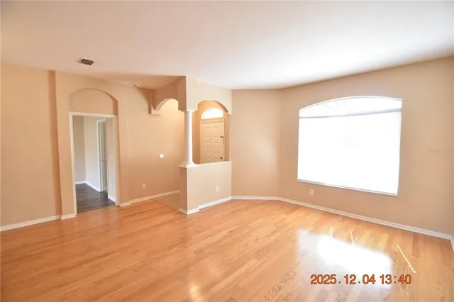 a view of an empty room and window