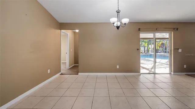 a view of an empty room with window