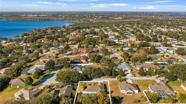 an aerial view of residential building with parking space