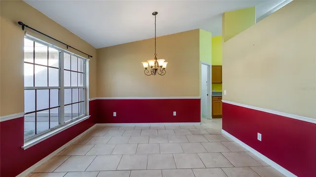 a view of workspace with furniture and window