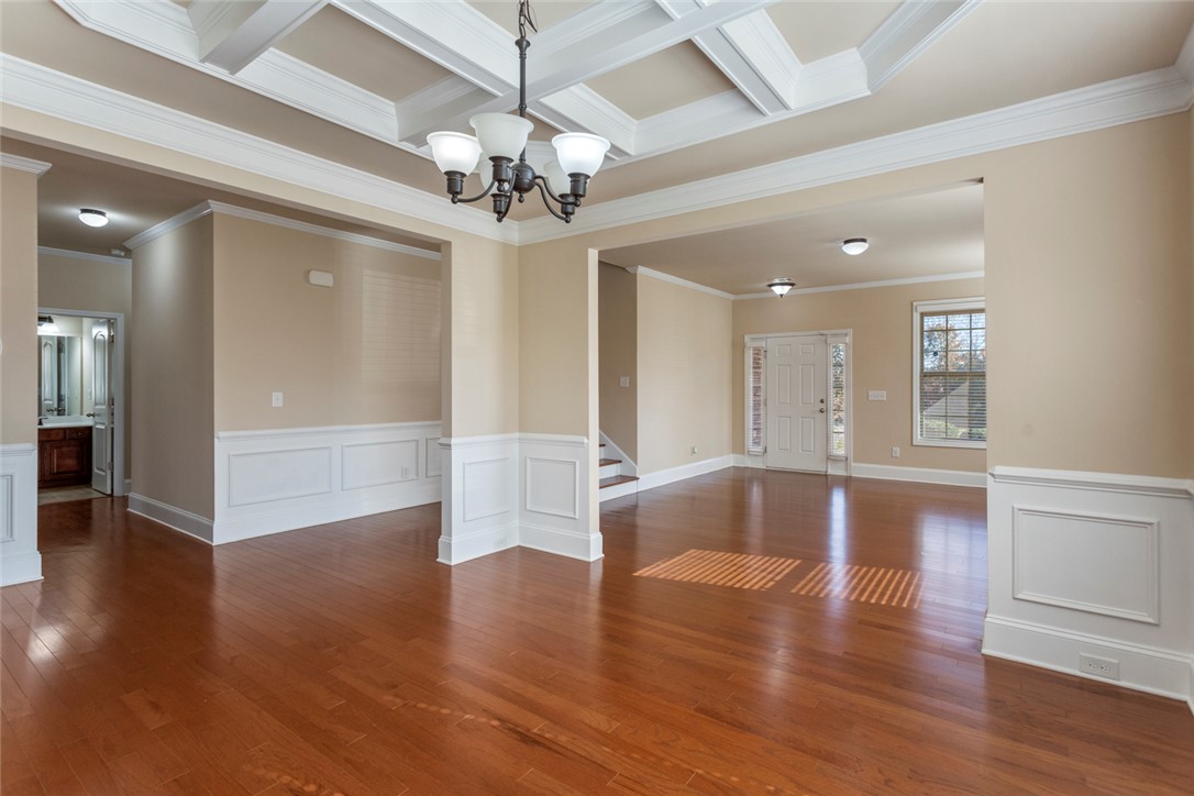1005 Winmar Drive Anderson, SC 29621 - Photo 16 of 50 This inviting space features elegant coffered ceilings and rich hardwood flooring.