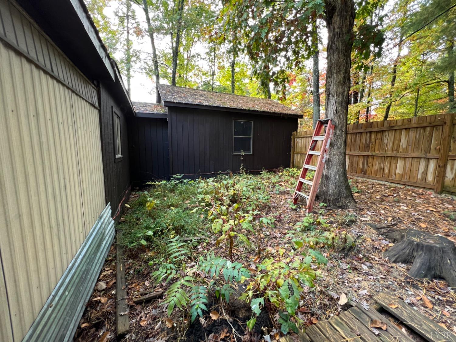 157 White Pine Drive Monroe, VA 24574 - Photo 11 of 13 a backyard of a house with lots of green space