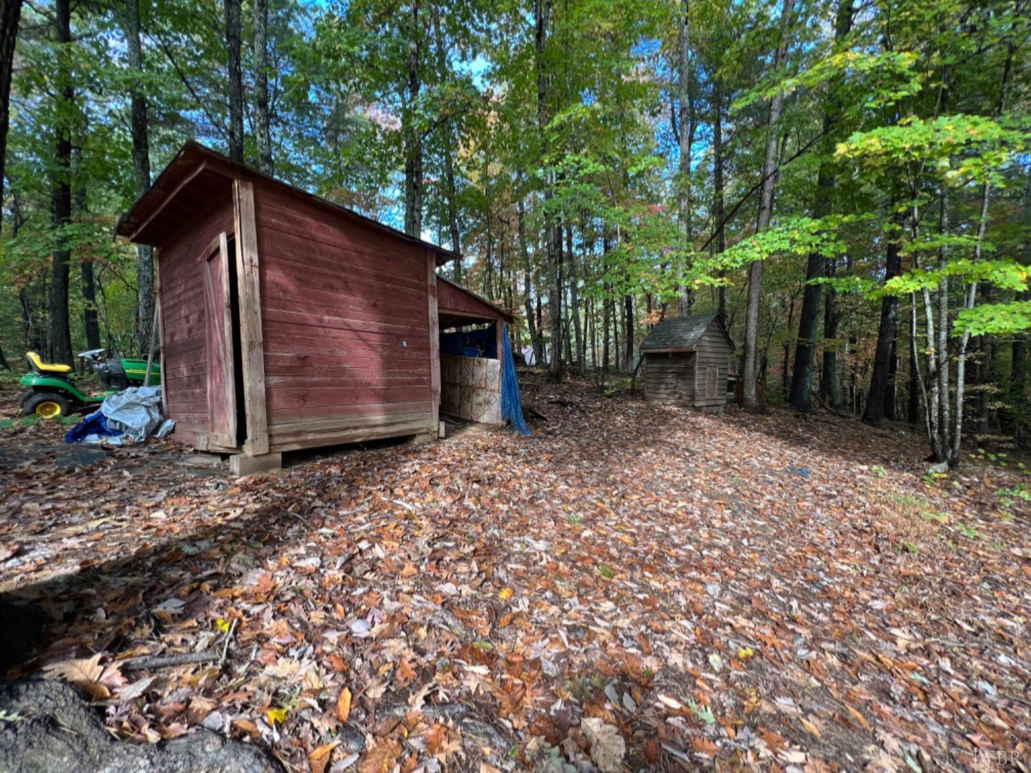 157 White Pine Drive Monroe, VA 24574 - Photo 13 of 13 a view of a house with a backyard