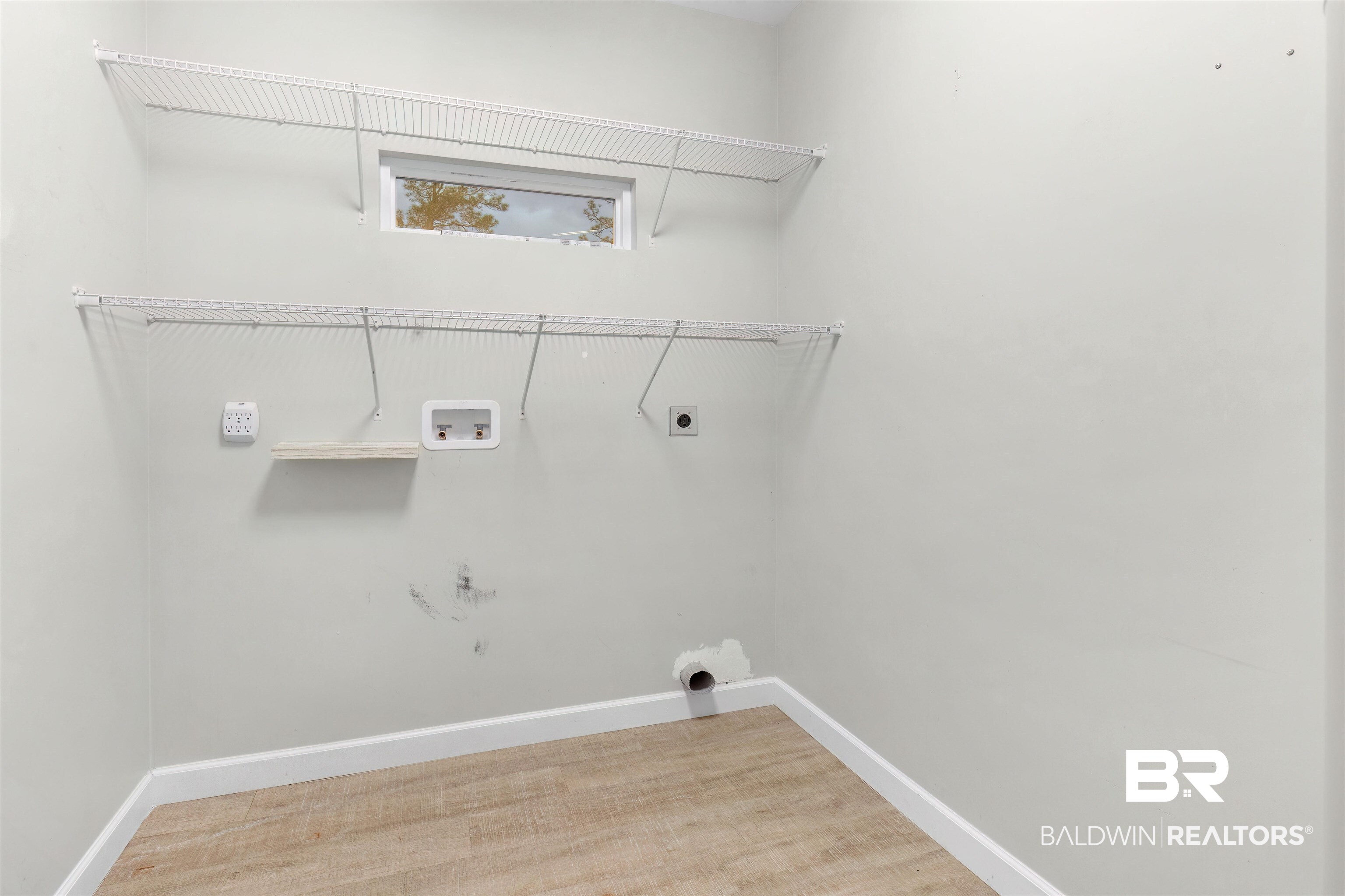 5625 Georgia Street Orange Beach, AL 36561 - Photo 23 of 30 Clothes washing area featuring electric dryer hookup and hookup for a washing machine