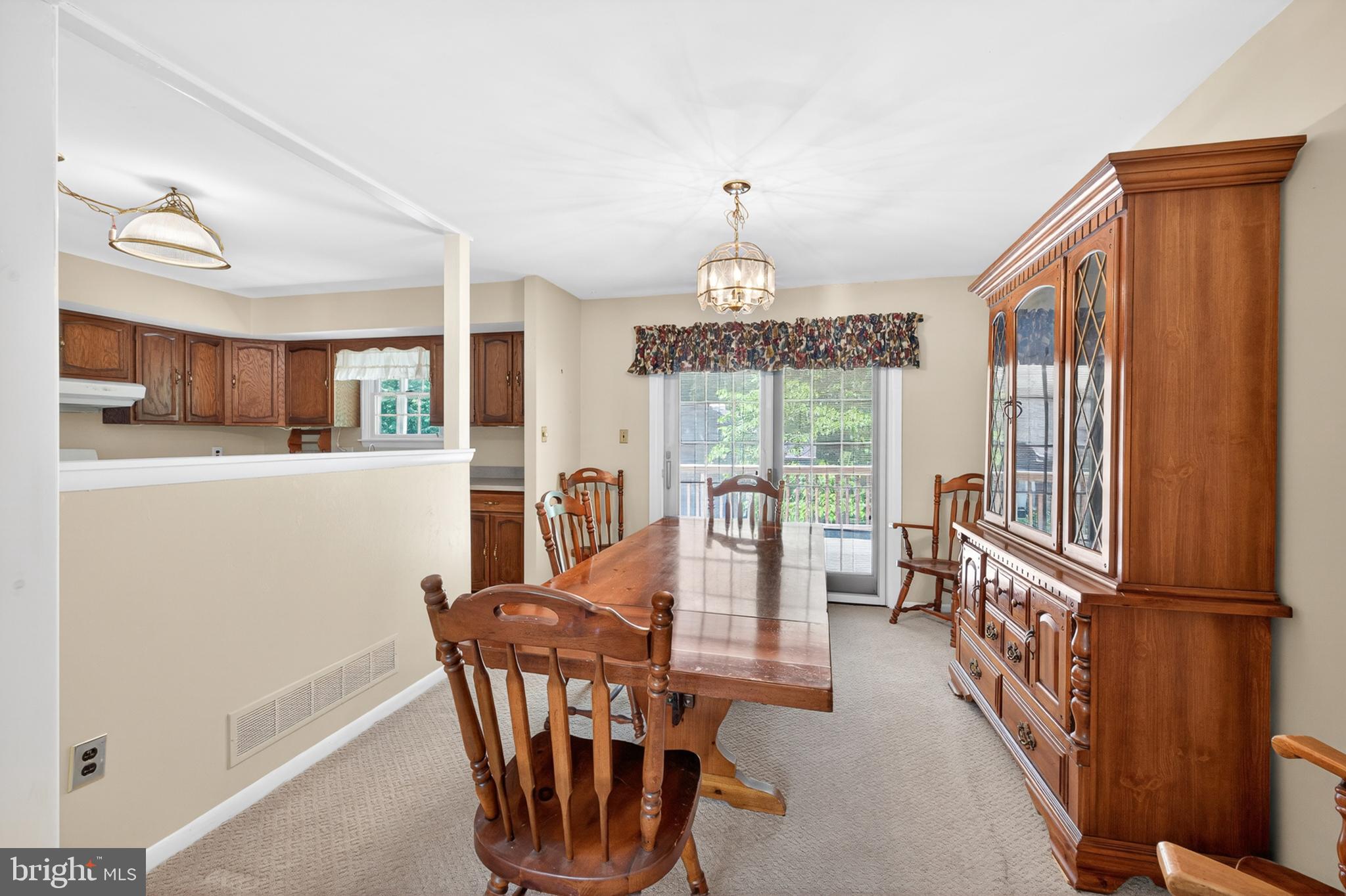 3701 Ebright Road Chadds Ford, PA 19317 - Photo 19 of 45 a view of a dining room with furniture window and wooden floor