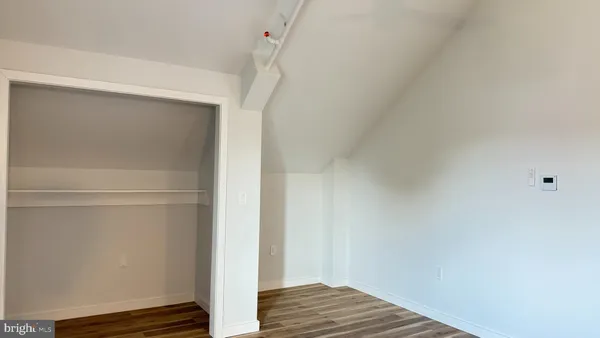 a view of small space with racks on the wall