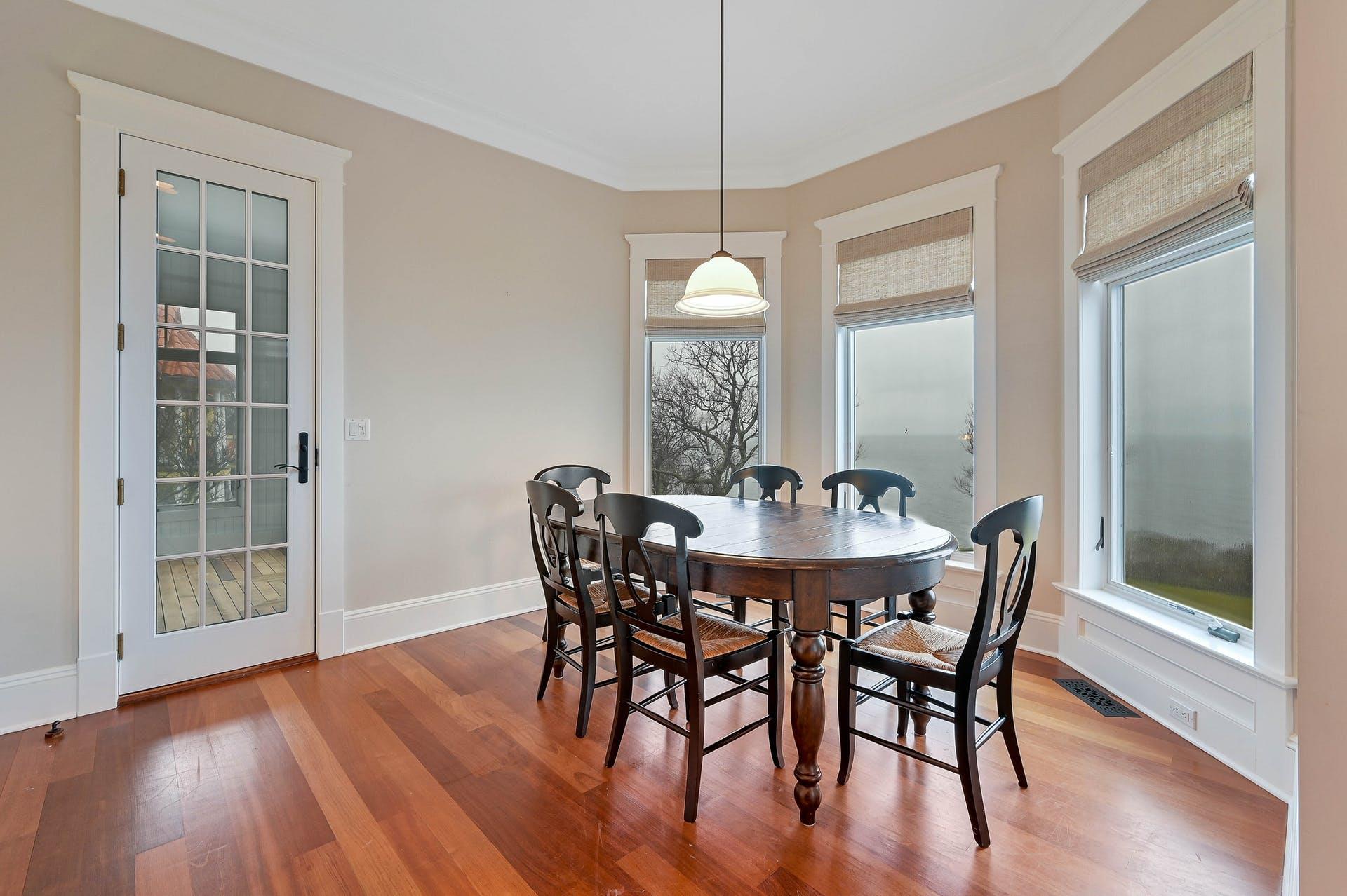 580 Lloyds Lane Mattituck, NY 11952 - Photo 17 of 30 Dining area featuring hardwood / wood-style floors and ornamental molding