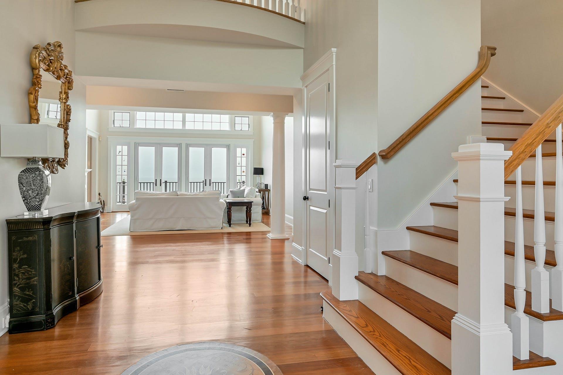 580 Lloyds Lane Mattituck, NY 11952 - Photo 6 of 30 Entryway featuring light hardwood / wood-style flooring and a high ceiling