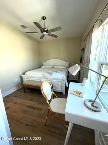 a spacious bathroom with a double vanity sink a mirror and shower