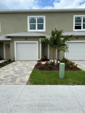 a view of swimming pool from a balcony