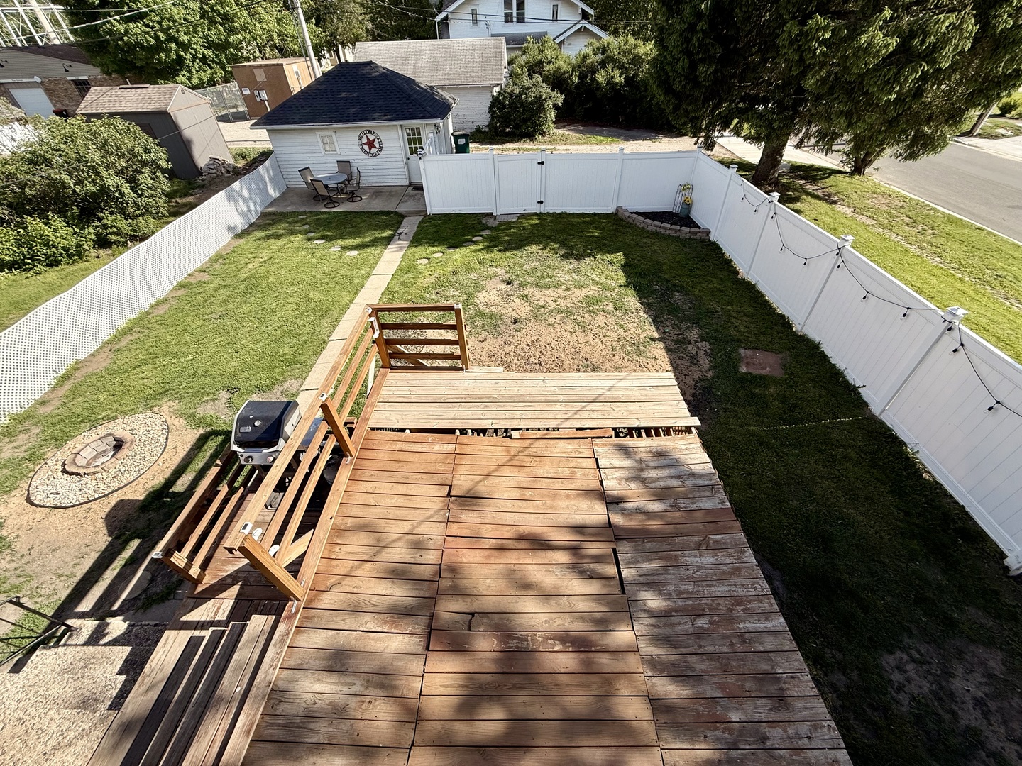 222 West Main Street Clinton, IL 61727 - Photo 23 of 25 a view of a backyard with swimming pool
