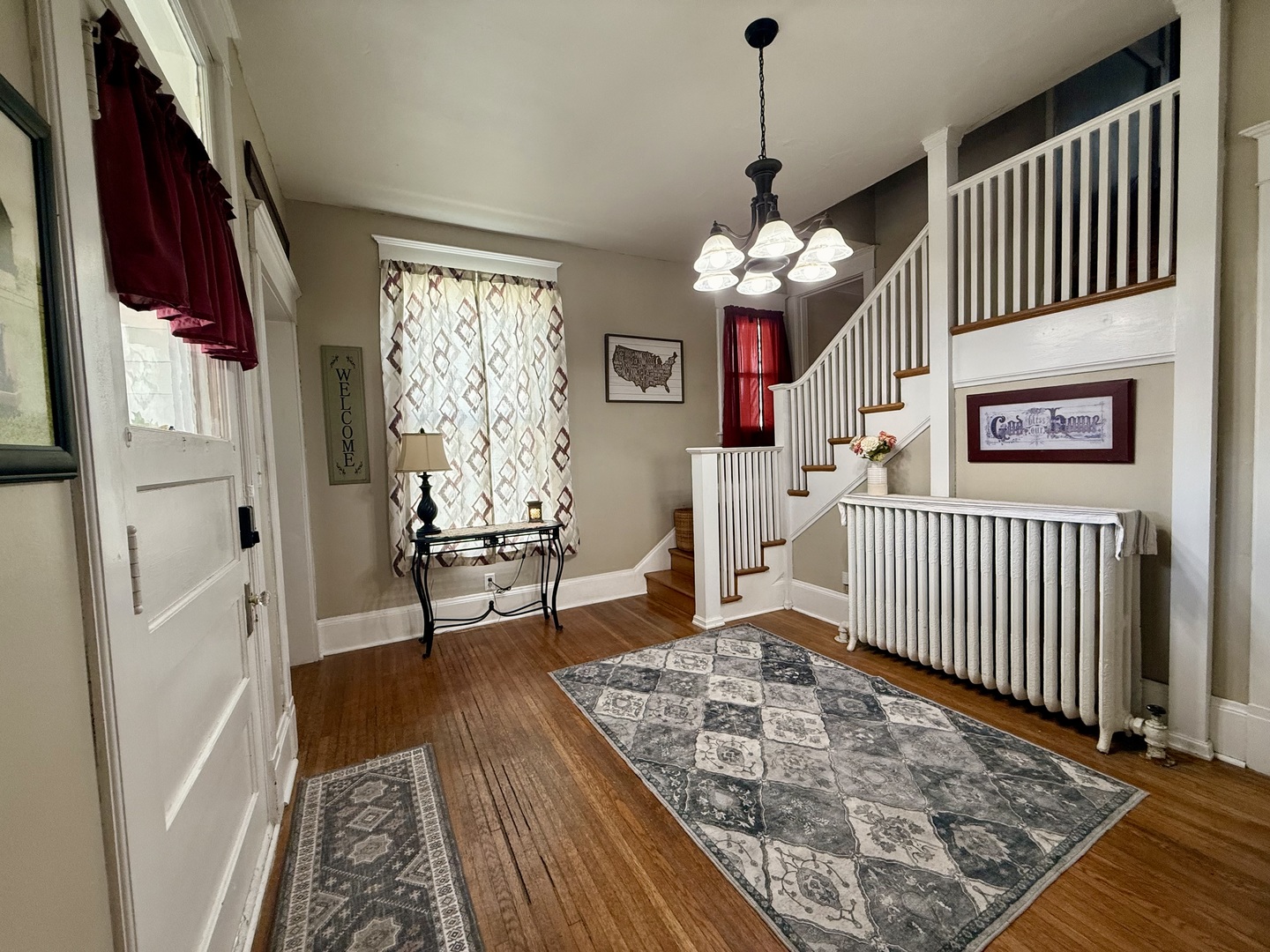 222 West Main Street Clinton, IL 61727 - Photo 4 of 25 a living room with furniture rug and a window