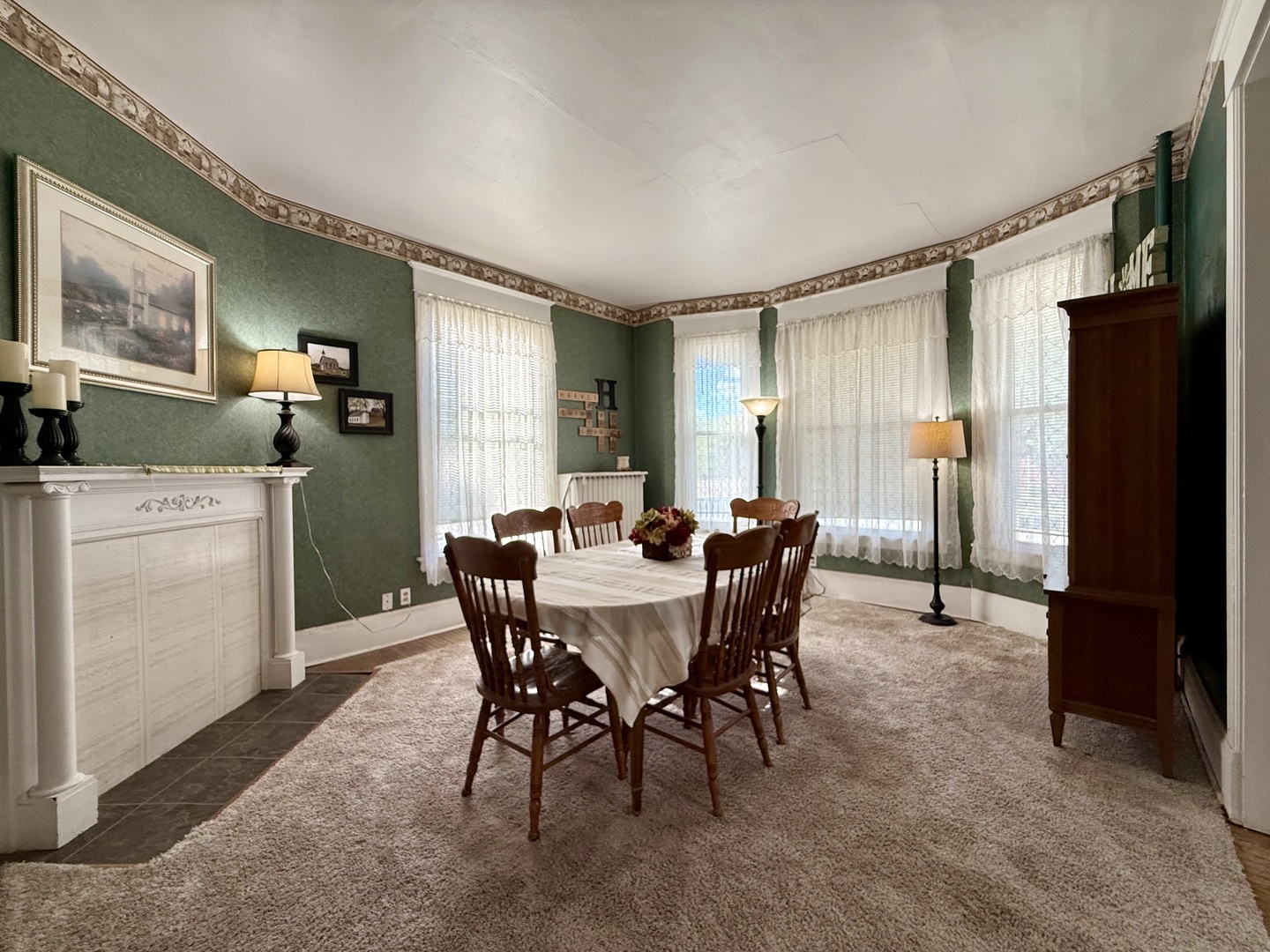 222 West Main Street Clinton, IL 61727 - Photo 5 of 25 a view of a dining room with furniture and window
