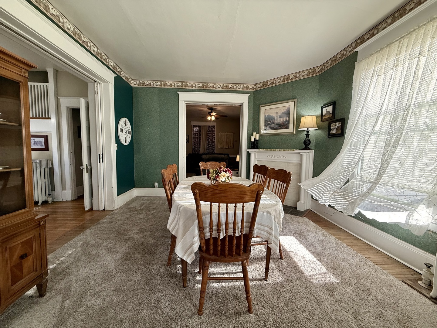 222 West Main Street Clinton, IL 61727 - Photo 6 of 25 a dining room with furniture and window