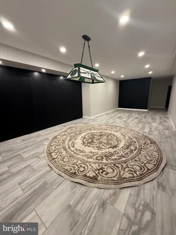 a view of a livingroom with a flat screen tv