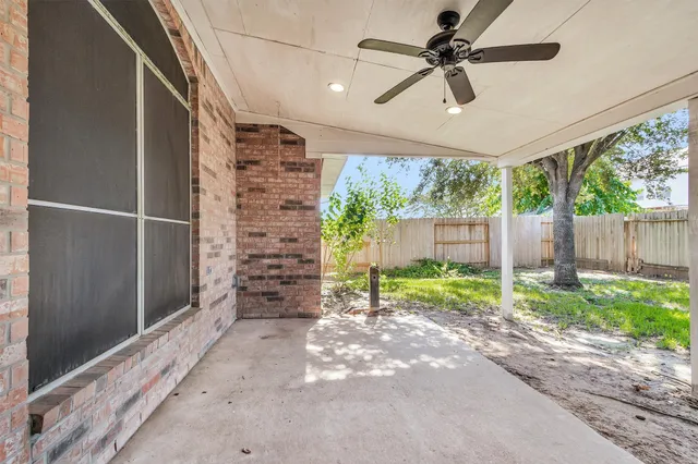 a backyard of a house with a garden and outdoor space