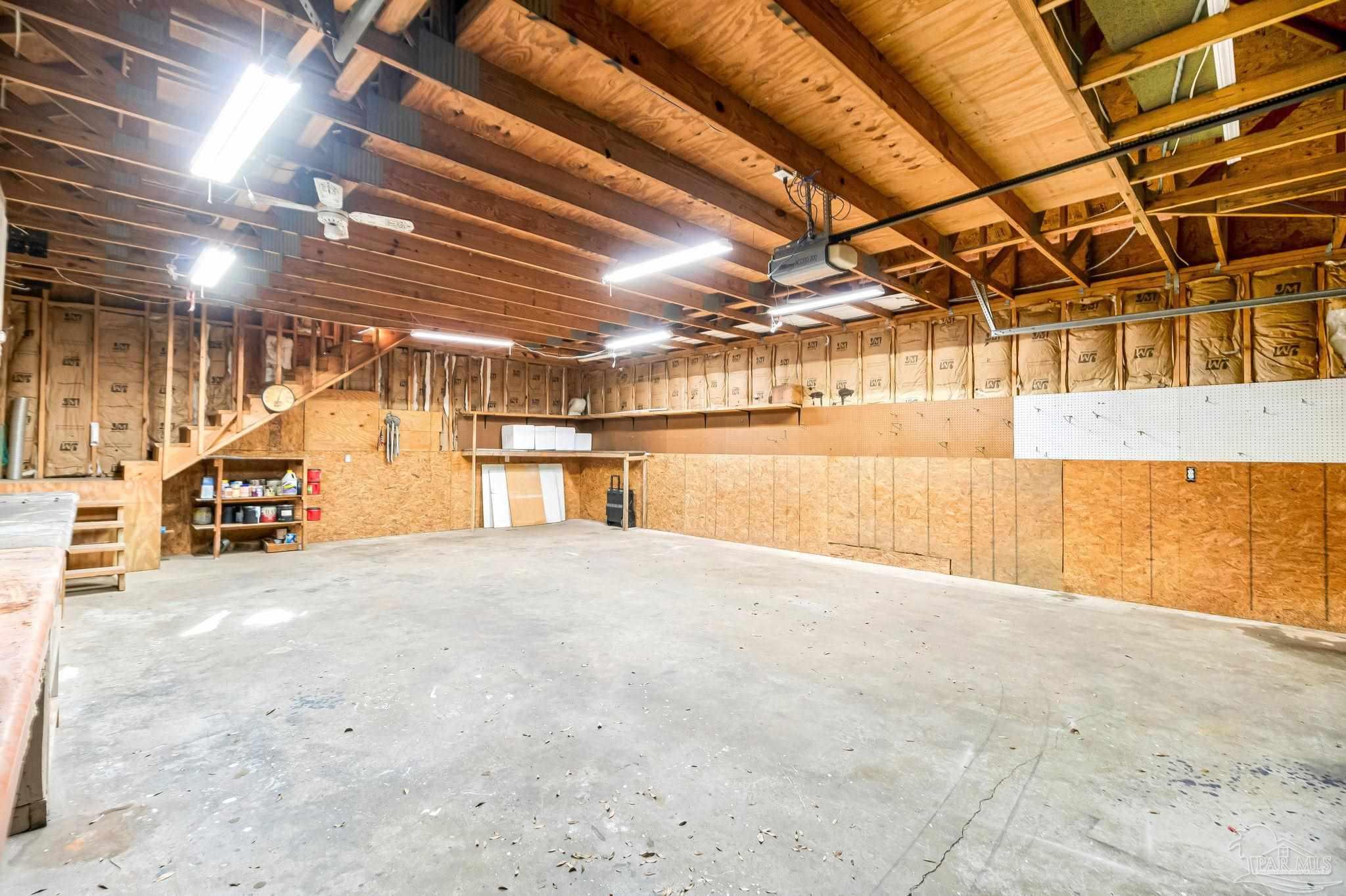 9320 Bell Ridge Drive Pensacola, FL 32526 - Photo 13 of 55 a view of a room with wooden ceiling