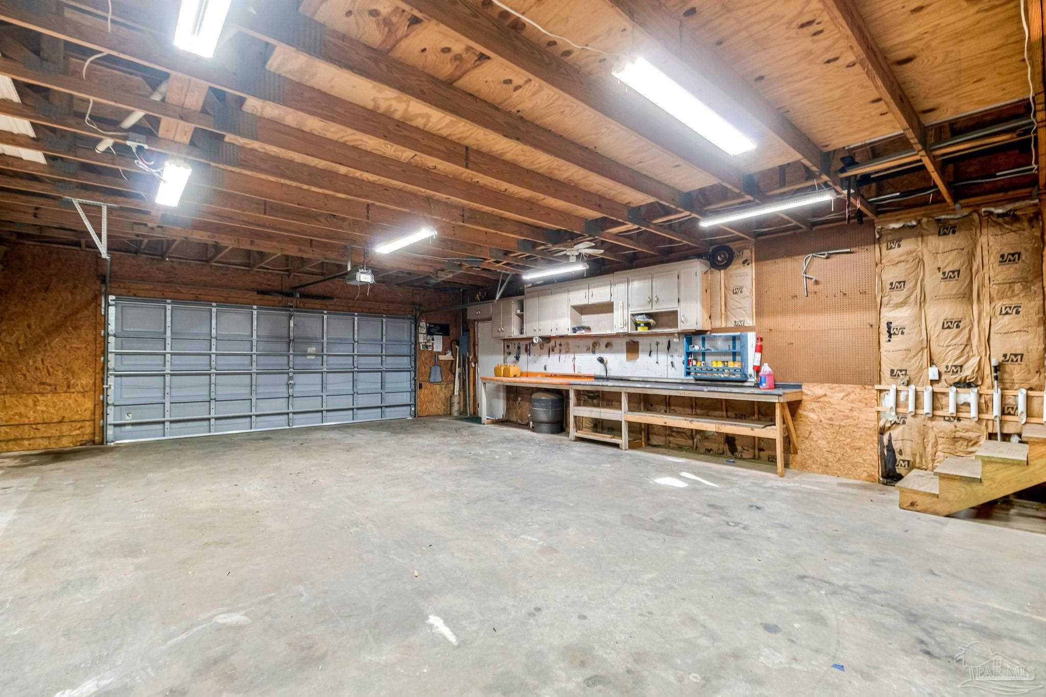 9320 Bell Ridge Drive Pensacola, FL 32526 - Photo 14 of 55 a view of a room with wooden ceiling