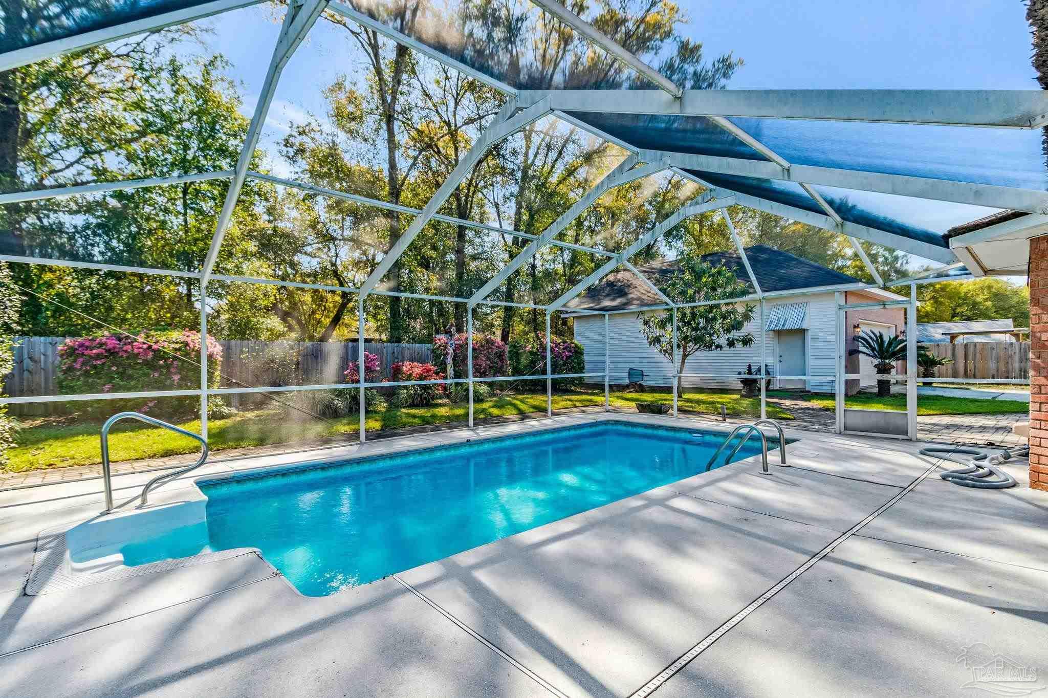 9320 Bell Ridge Drive Pensacola, FL 32526 - Photo 23 of 55 a view of swimming pool with sitting area