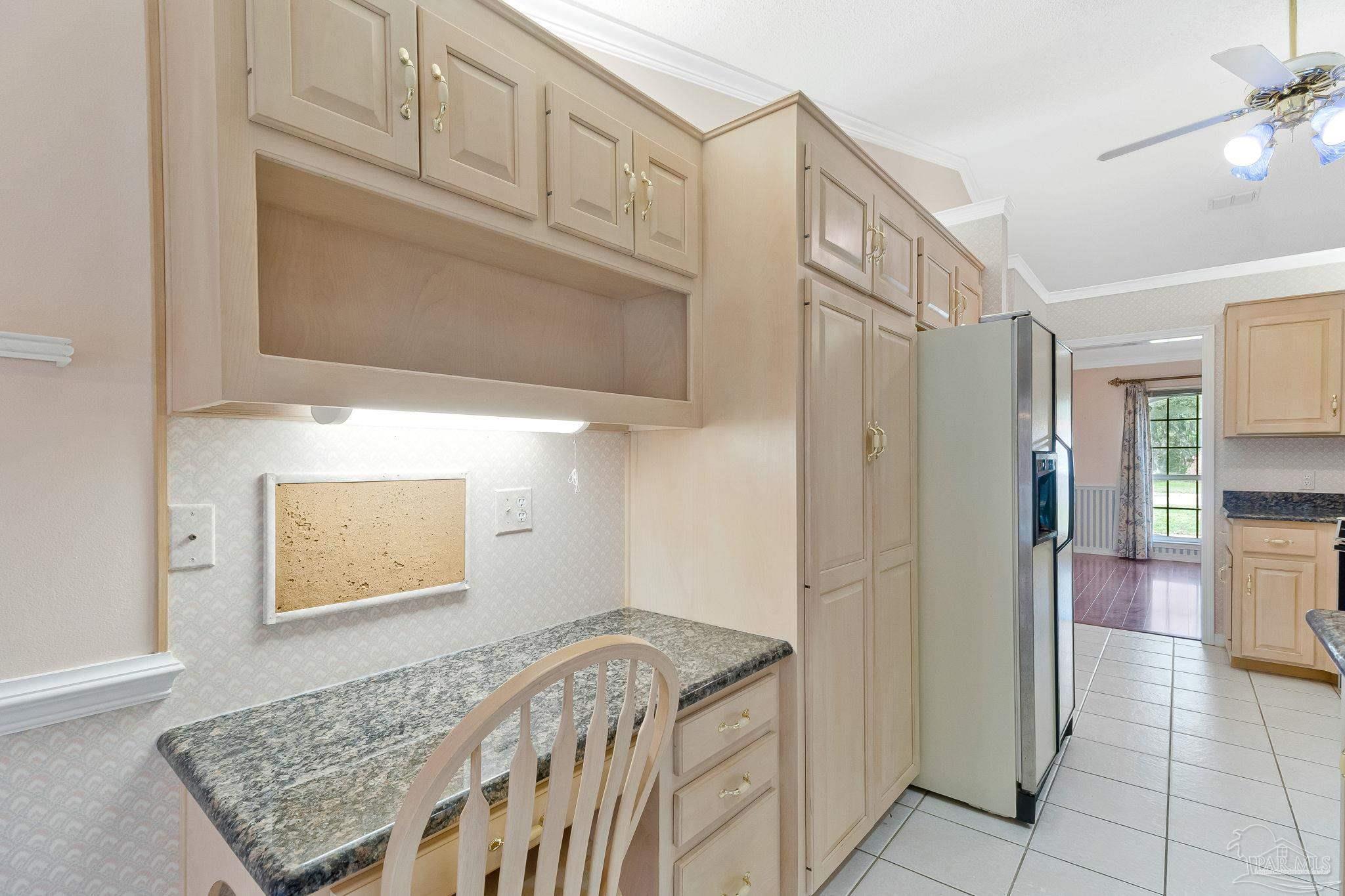 9320 Bell Ridge Drive Pensacola, FL 32526 - Photo 29 of 55 a bedroom with a bed and a cabinets