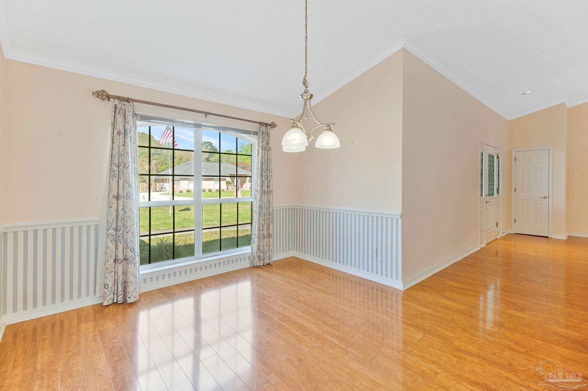 9320 Bell Ridge Drive Pensacola, FL 32526 - Photo 32 of 55 a view of an empty room with glass door