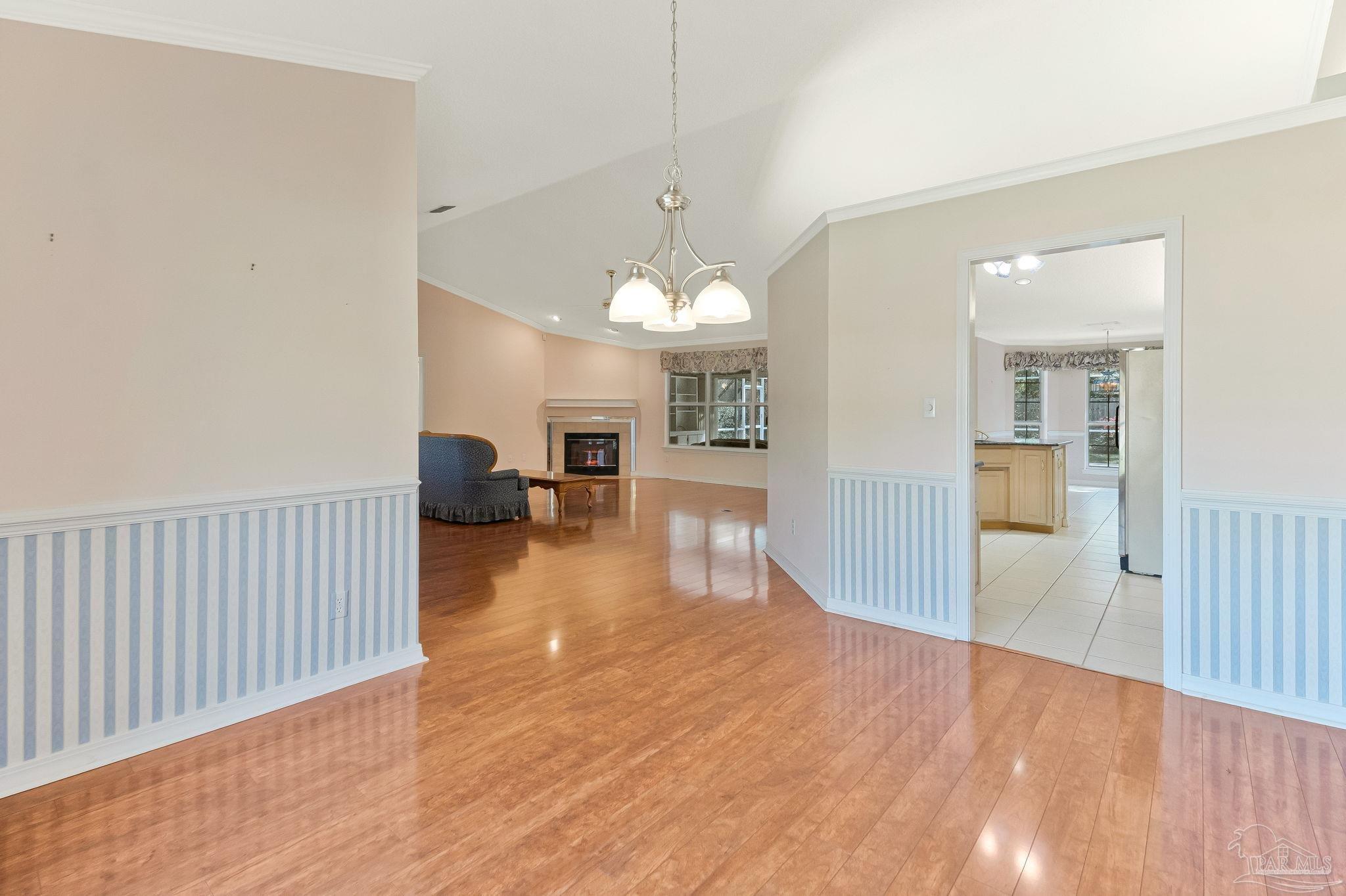 9320 Bell Ridge Drive Pensacola, FL 32526 - Photo 33 of 55 a view of a livingroom with wooden floor and a large window