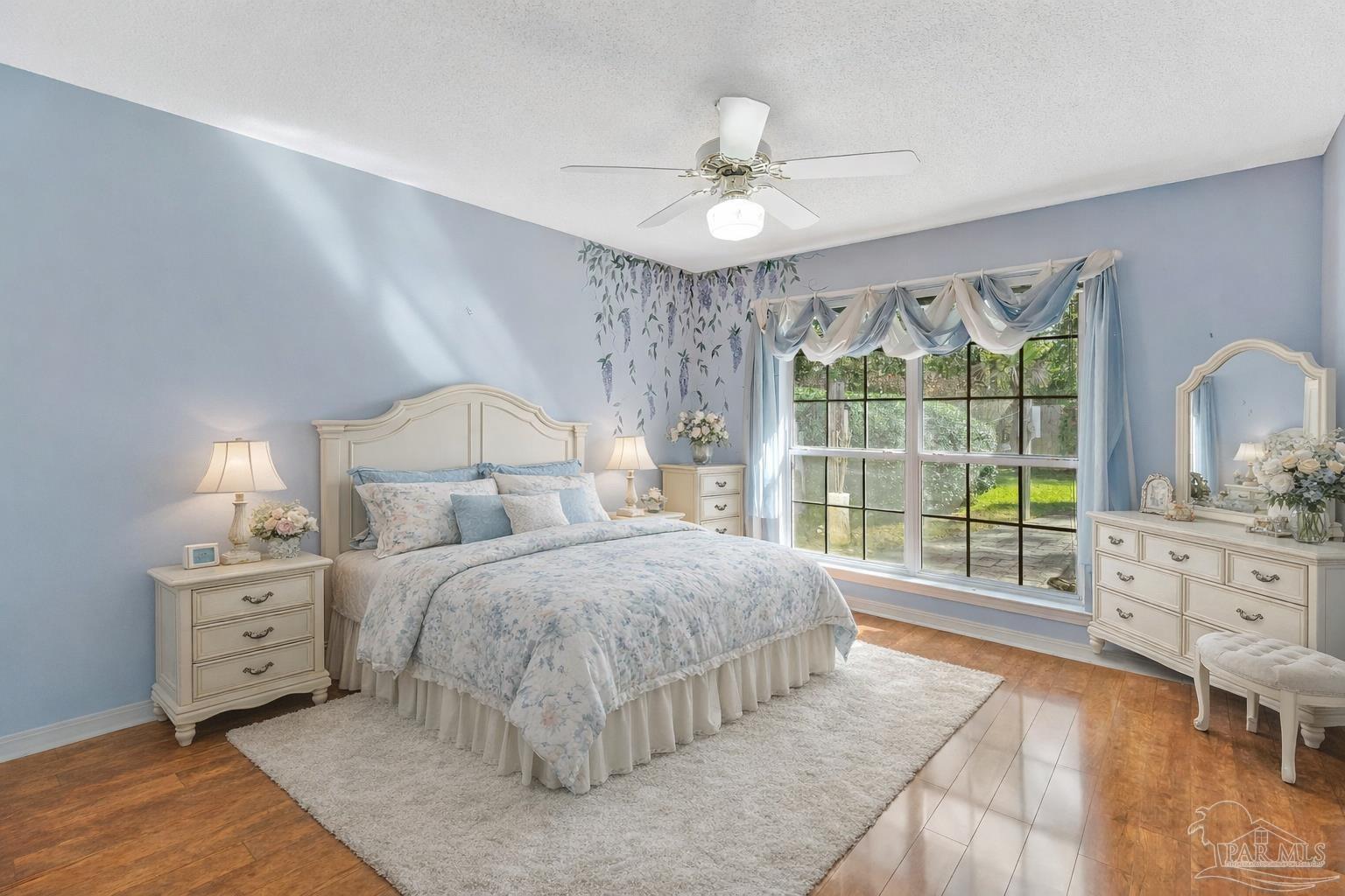 9320 Bell Ridge Drive Pensacola, FL 32526 - Photo 43 of 55 a bedroom with a large bed and a window