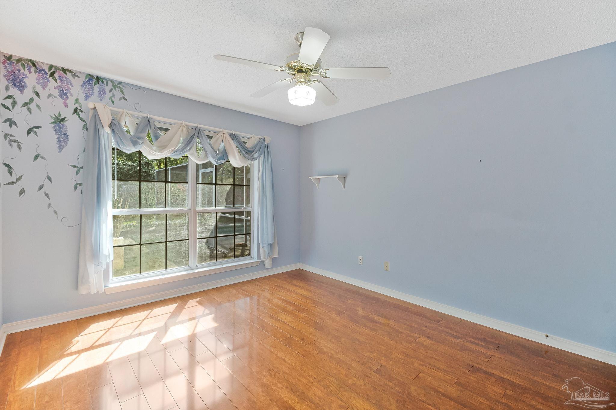 9320 Bell Ridge Drive Pensacola, FL 32526 - Photo 44 of 55 a view of an empty room with a window