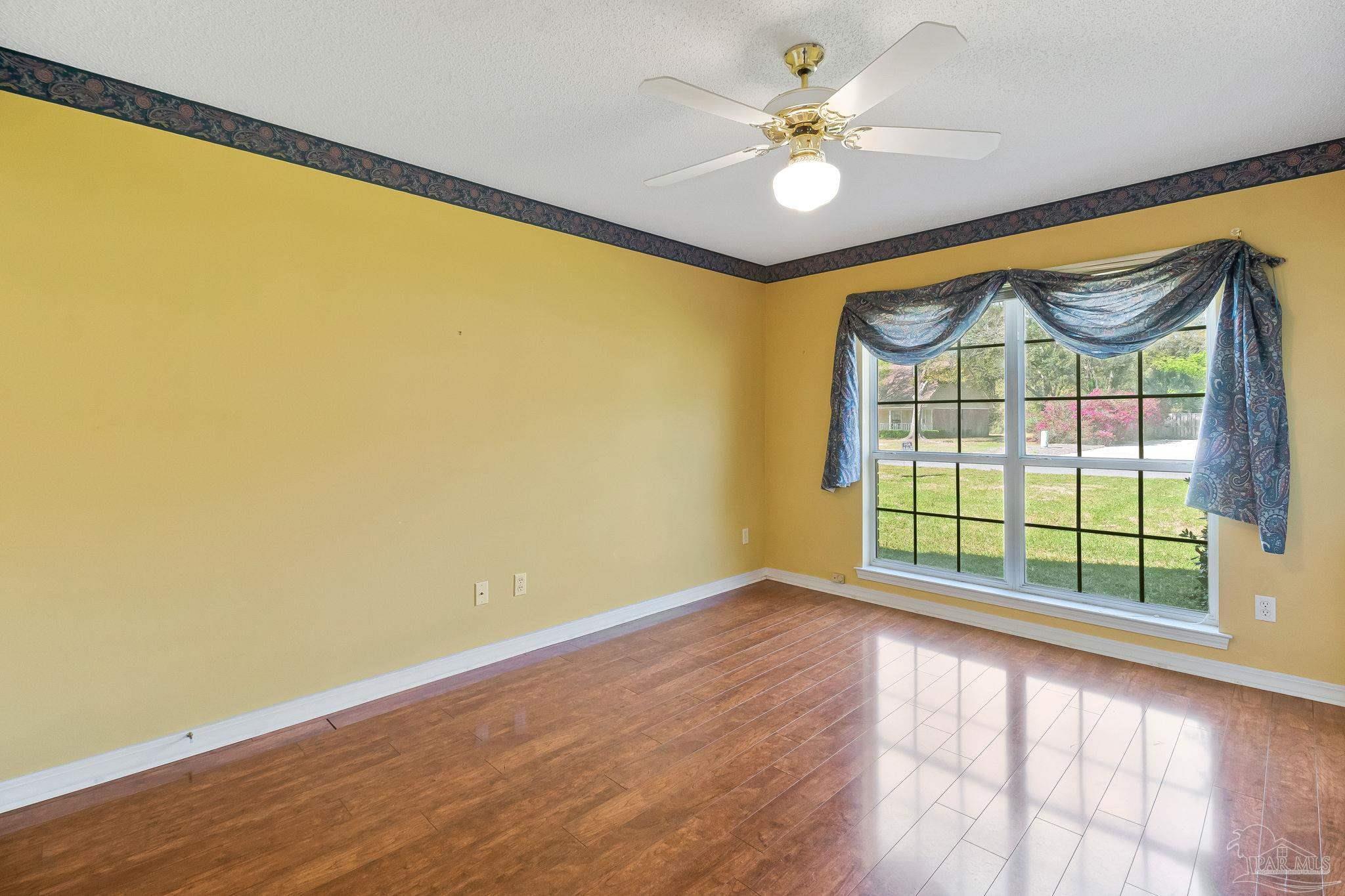 9320 Bell Ridge Drive Pensacola, FL 32526 - Photo 48 of 55 a view of an empty room with a window