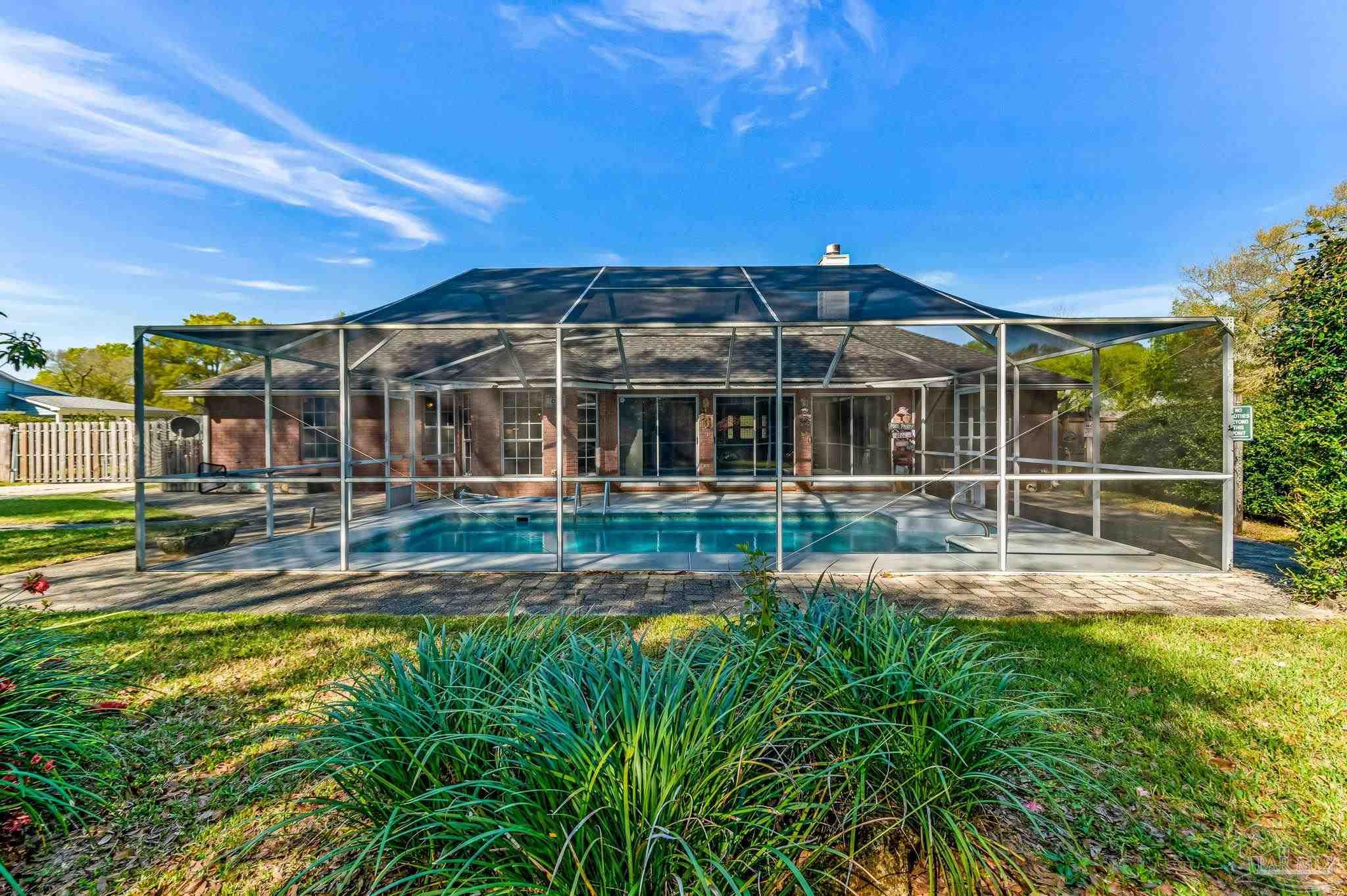 9320 Bell Ridge Drive Pensacola, FL 32526 - Photo 54 of 55 a view of a house with swimming pool
