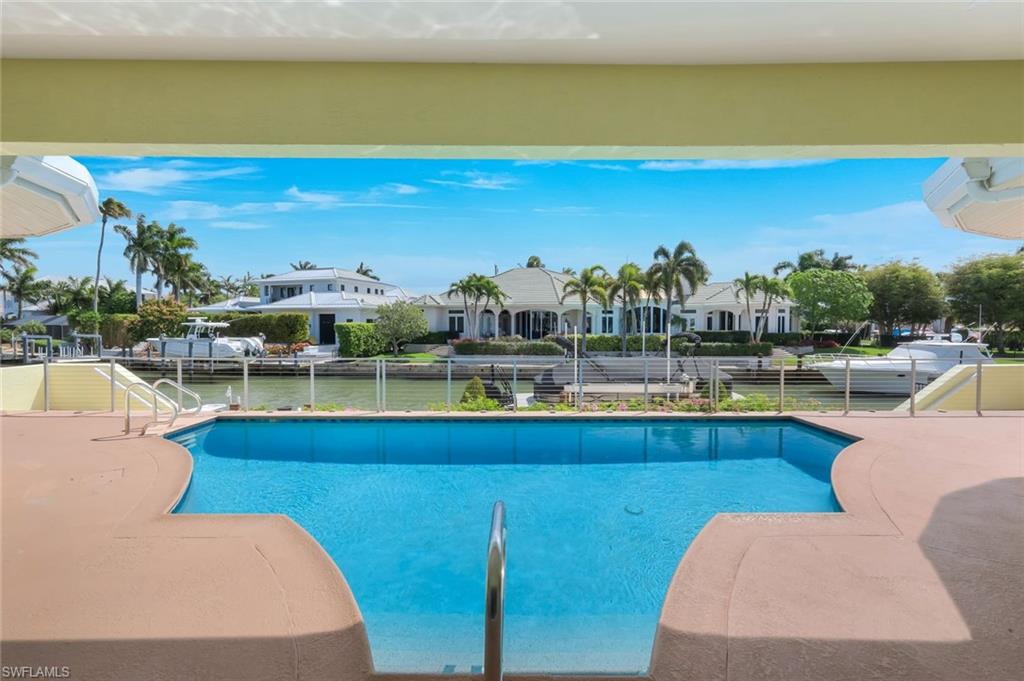 2147 Snook Drive Naples, FL 34102 - Photo 30 of 50 View of pool