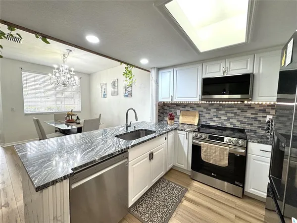 a view of a porch with furniture