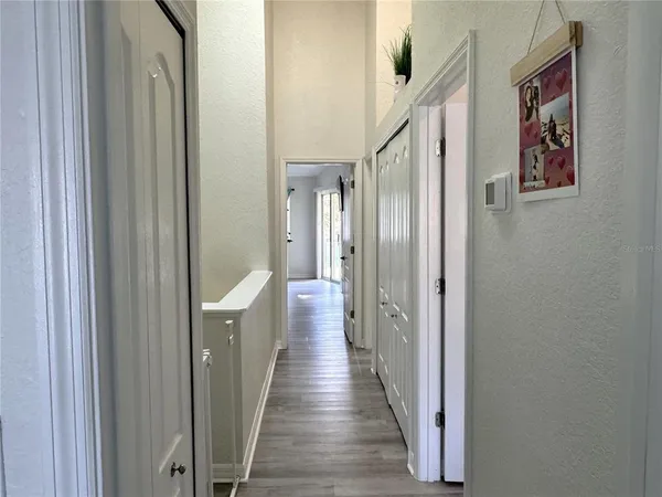 a view of a swimming pool with a patio