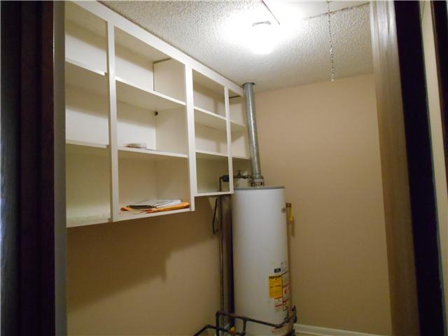 121 Sam Davis Drive Springfield, TN 37172 - Photo 11 of 20 LARGE SHELVED UTILITY SPACE.